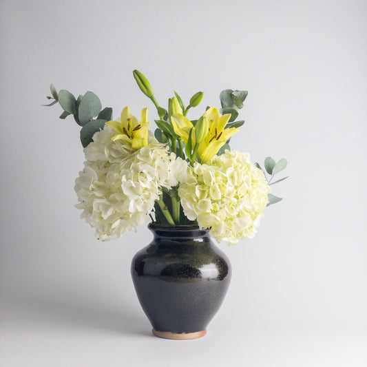 A quick guide to turning those grocery store bouquets into a centerpiece!