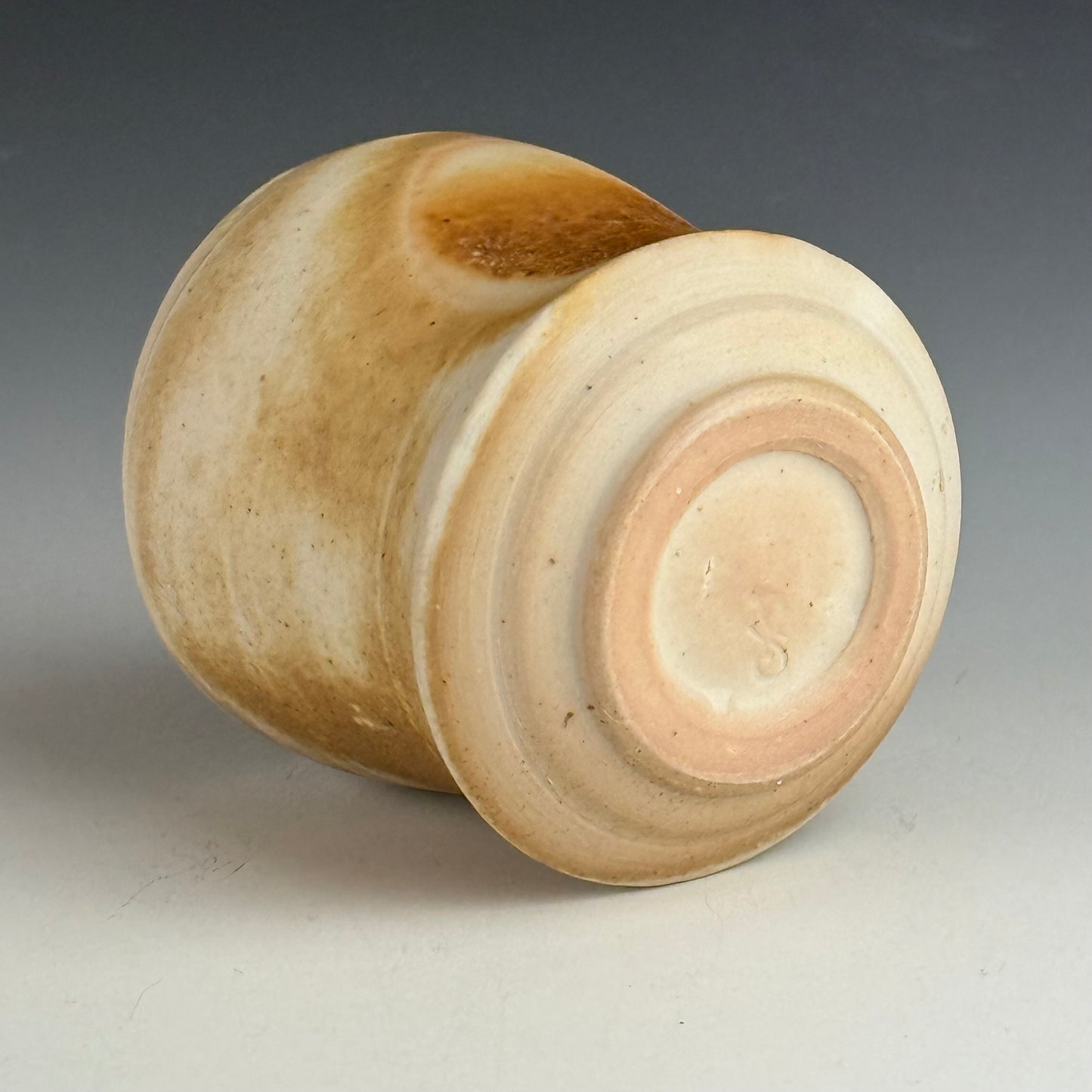 Side-fired cocktail cup