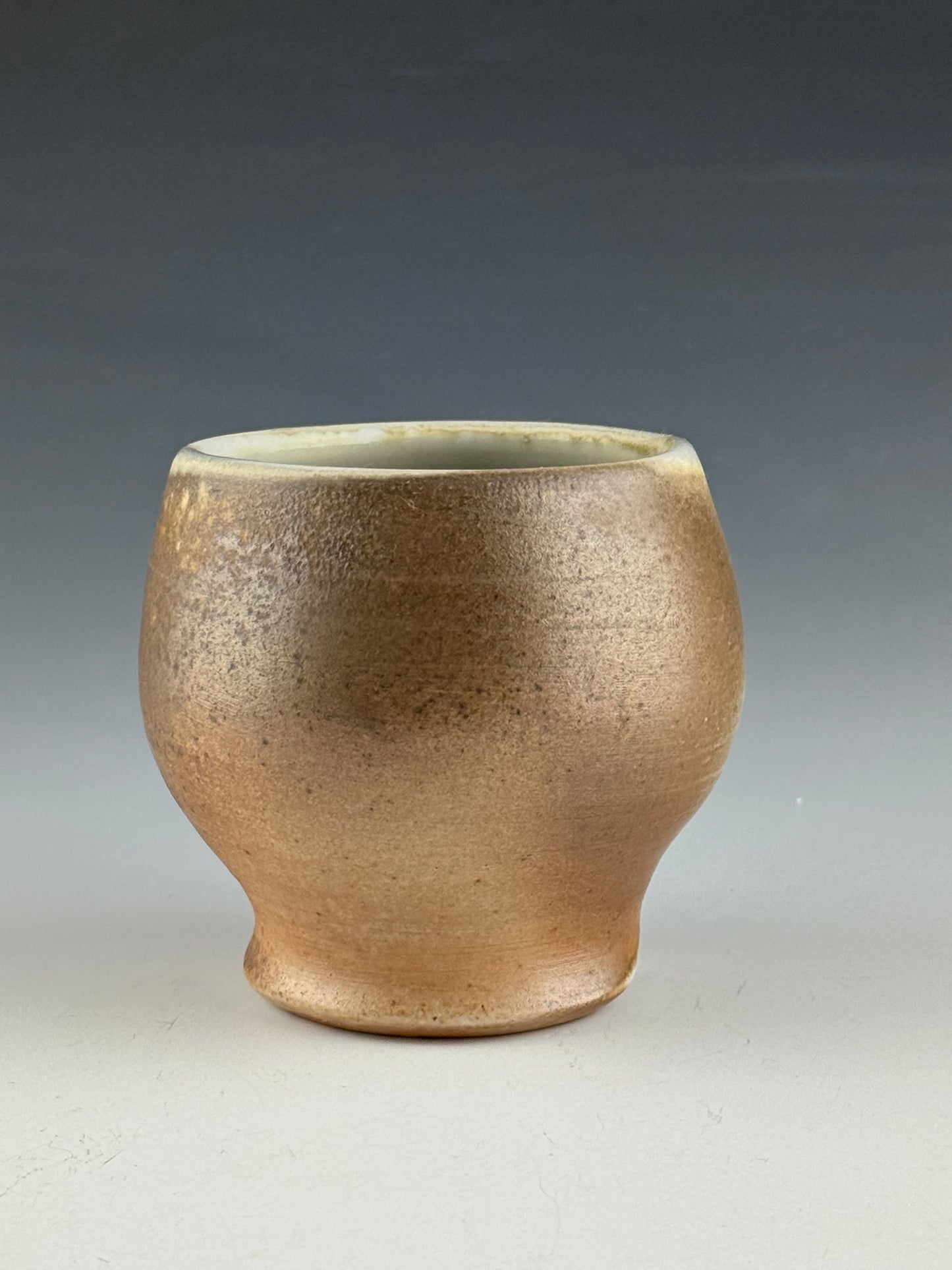 Creamy cup for tea or wine
