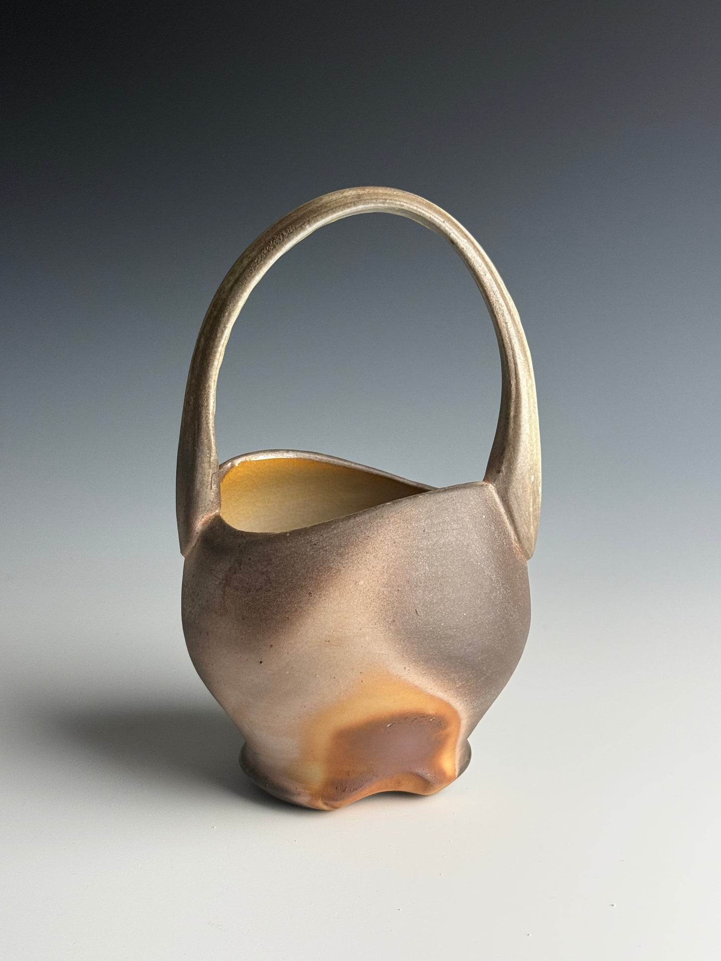 Side fired basket