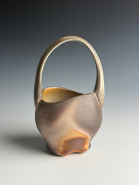 Side fired basket