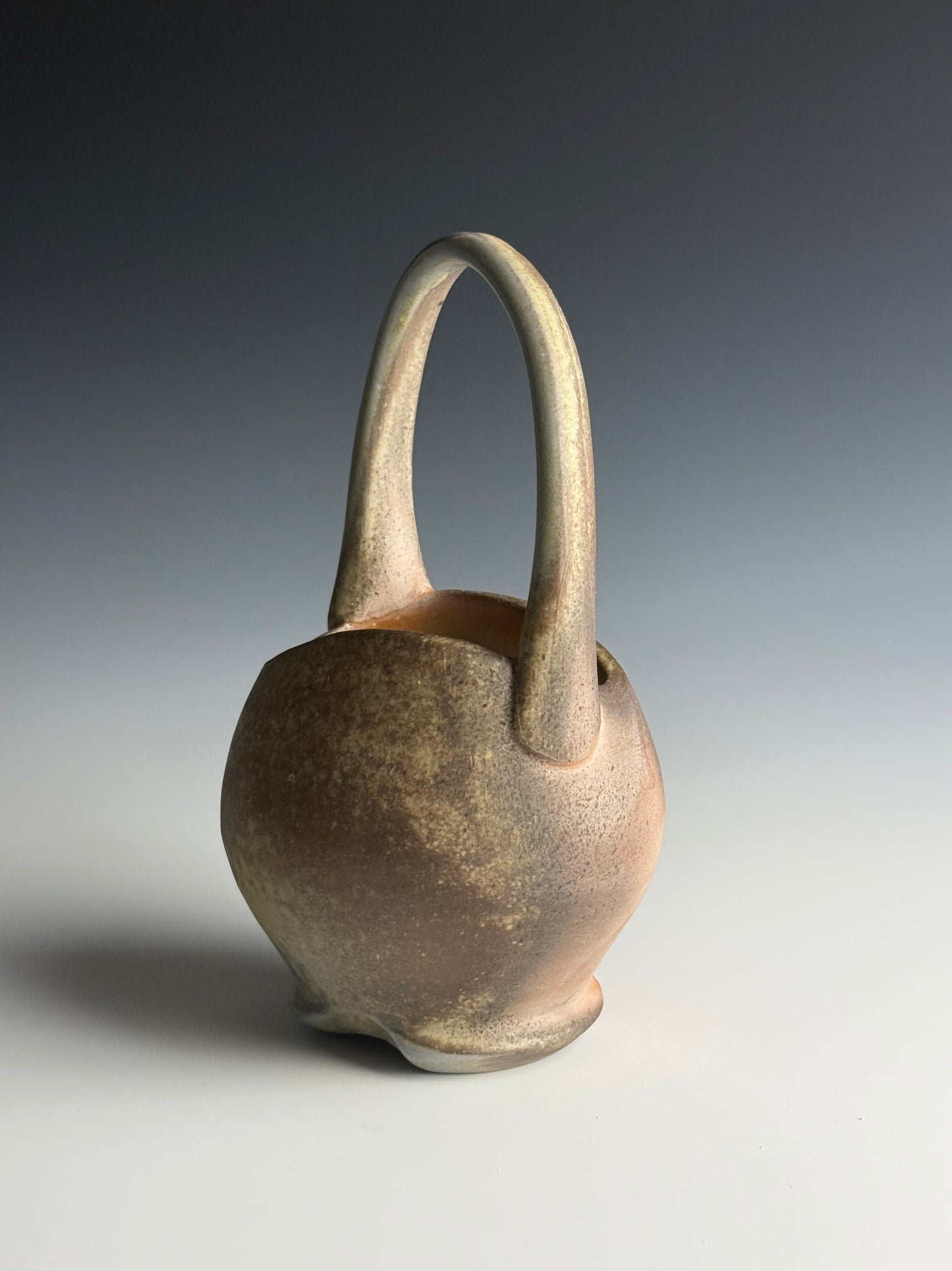 Side fired basket