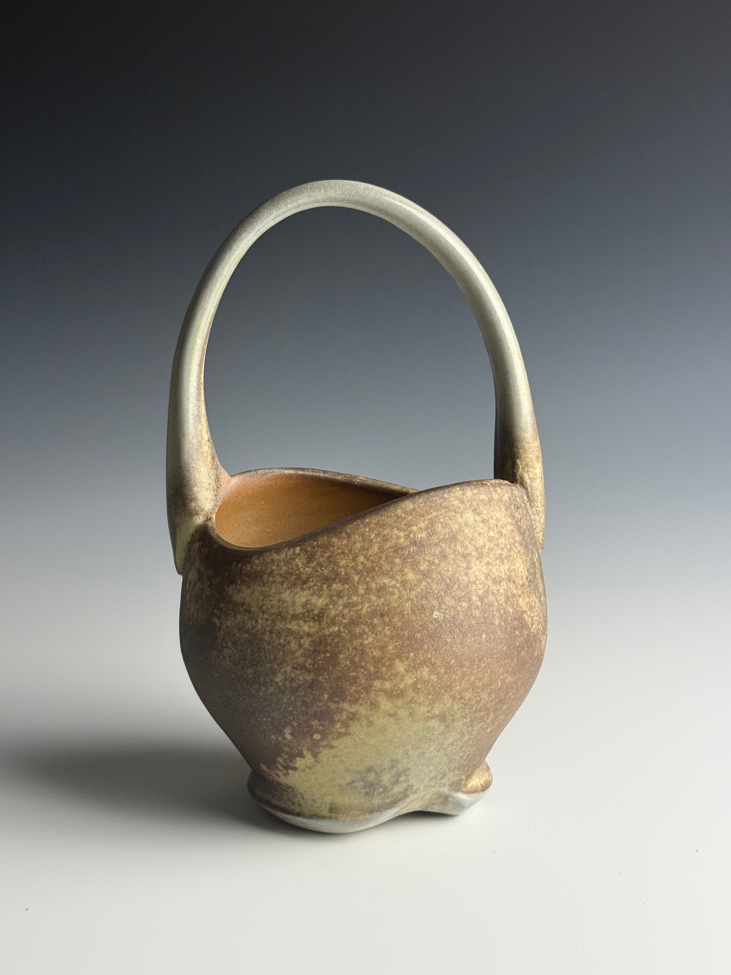 Side fired basket