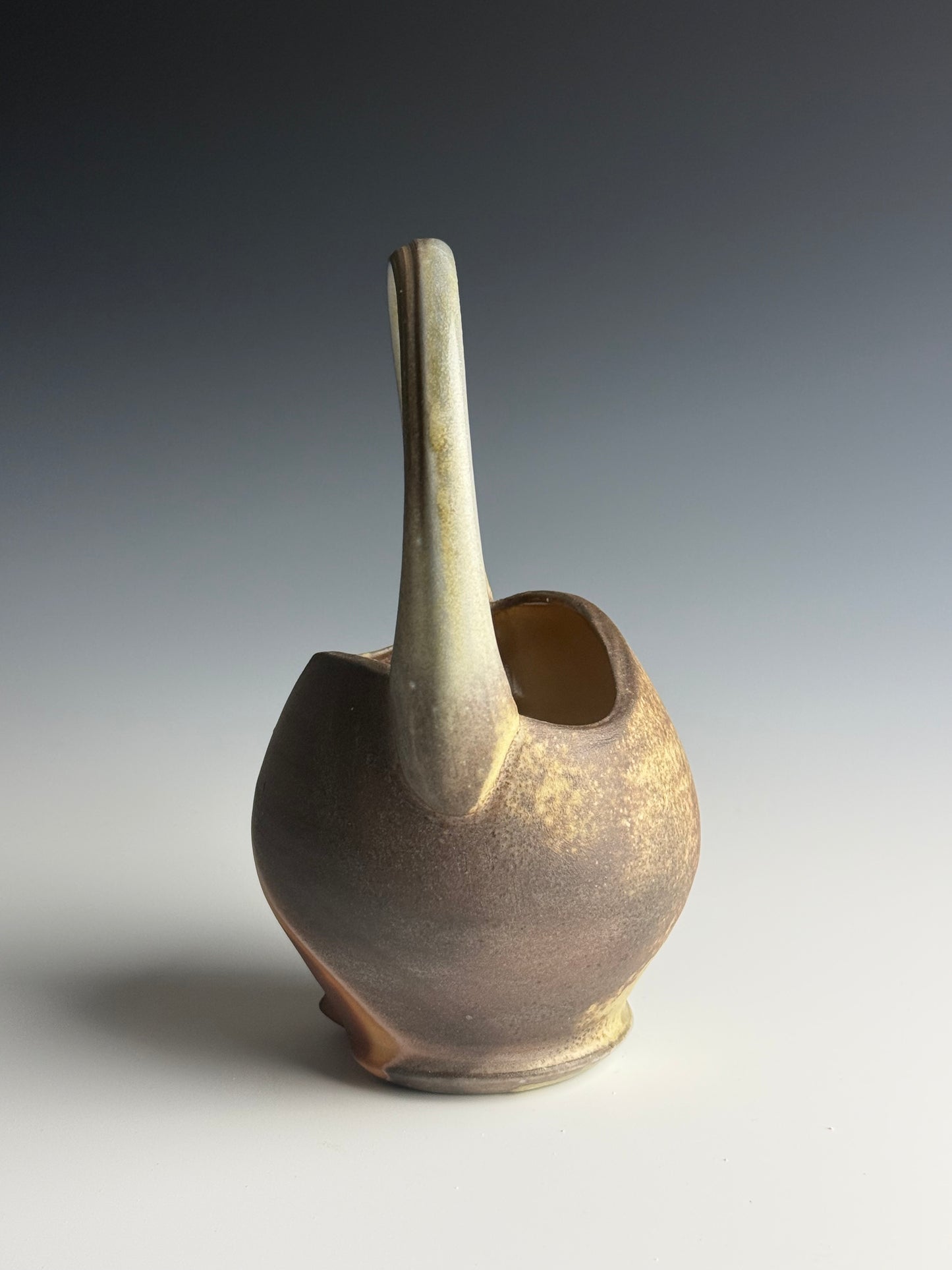 Side fired basket