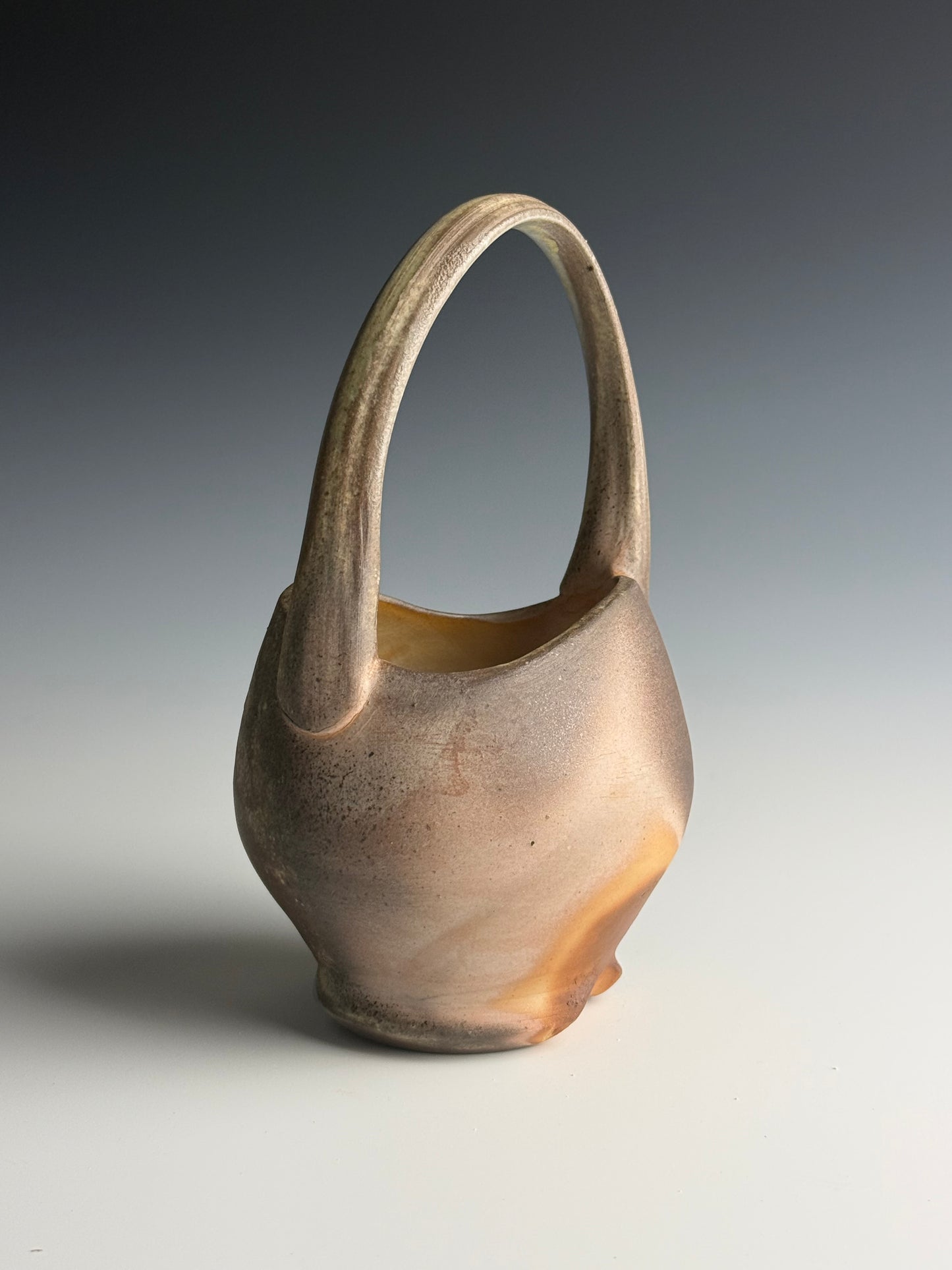 Side fired basket