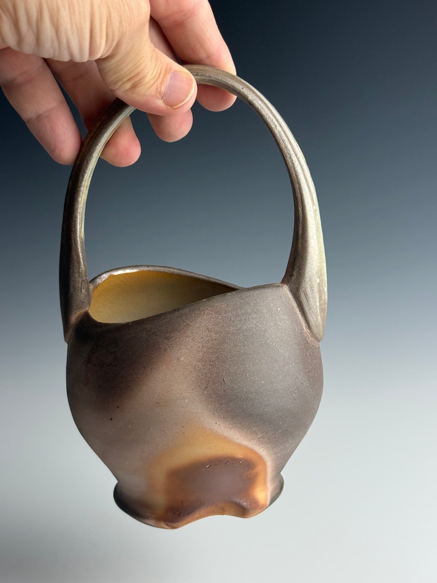 Side fired basket