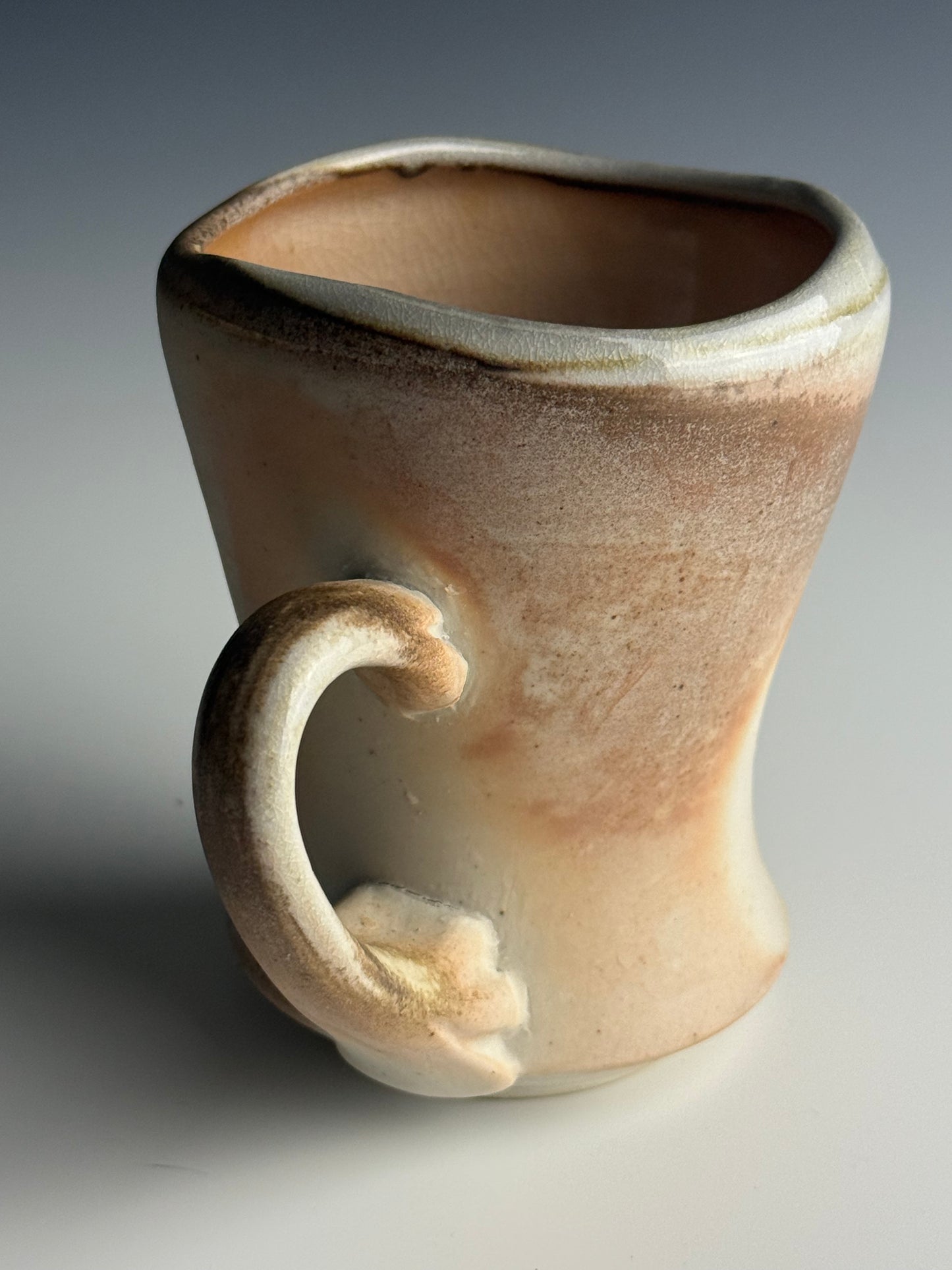 Side fired peaches and cream mug